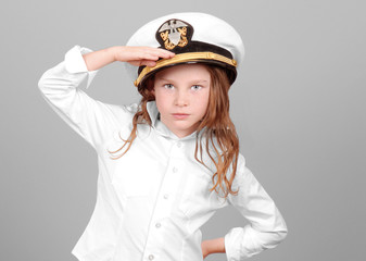Young Girl Saluting in Uniform