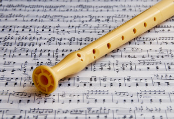 Flute on a music sheet