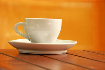 Clear cup of coffee on a table