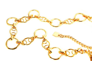 golden ring chain isolated on white