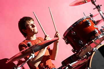 man playing on drum