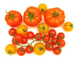 Tomatoes red, cherry and yellow isolated on white background
