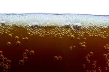 unfiltered dark beer with foam