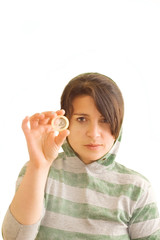 Adolescent female holding a condom.