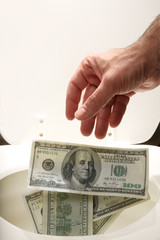 Man throwing away money