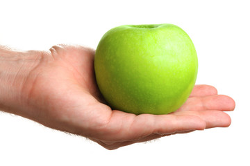 Man holding delicious green apple