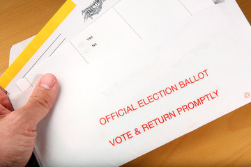 Man opening mail in ballot