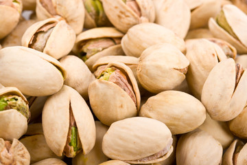 Pile of pistachio nuts close up