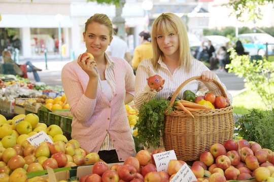 two women on the fruit market
