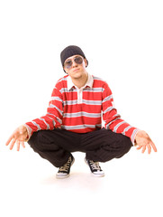 teenager in sunglasses sitting on the floor