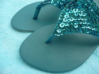 Fotobehang Sandals flip-flops or thongs © B.Grateful