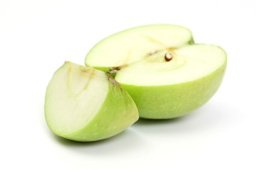 Half and slice green apple