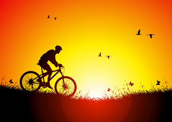 Fototapeta na wymiar Mountain bike at sunset