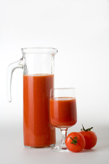 tomato juice with two red tomatoes, isolated
