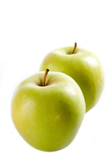 two green apples, isolated on white background