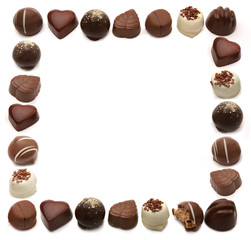 Frame of chocolate pralines with empty copy space inside