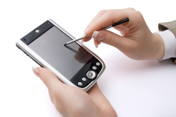 Woman hands holding pda and stylus