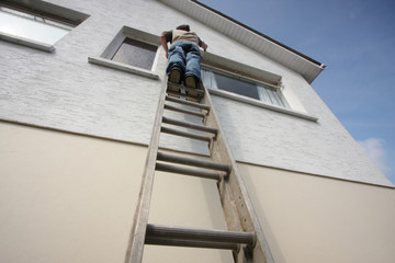 Man using a ladder