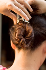 Naklejka premium Hair Twirl from Behind