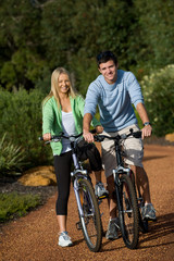 Fototapeta na wymiar Couple On Bikes