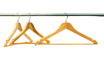 Three coathangers on a clothes rail