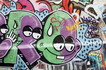 Graffiti - grüne und violette Zeichen © Philophoto