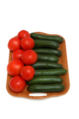 Cucumbers and tomatoes  isolated on the white