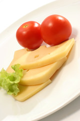 cheese slices and tomatoes with lettuce