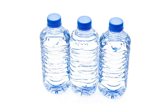 Three bottle of water - isolated object..