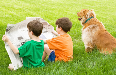 Two Boys Reading the Newspaper