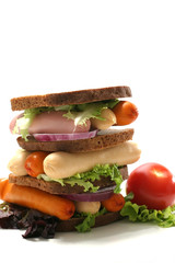 raw fresh pork and chicken sausages in sandwich