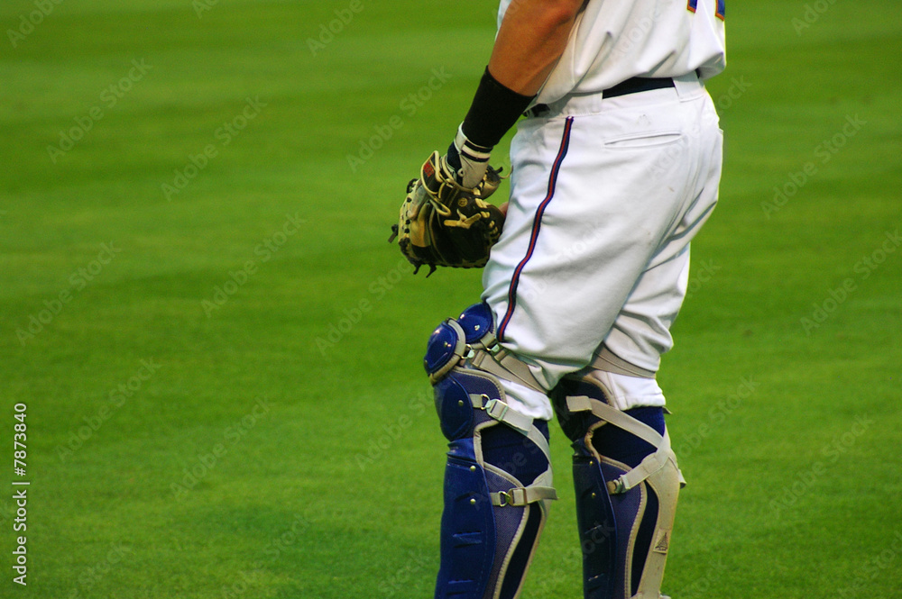 Wall mural Baseball catcher, standing on the field