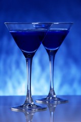 Two martini glasses in blue