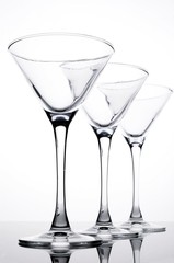 Three empty martini glasses