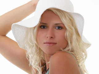 portrait of young blond woman with white hat