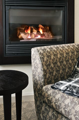 Fireplace and armchair