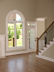 Luxury Model Home Living Room with Staircase