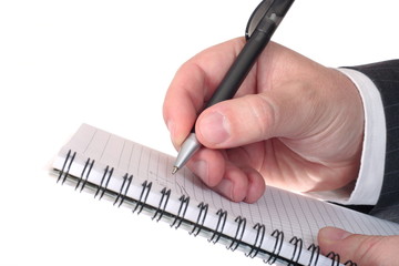 Businessman hand with pen and notepad