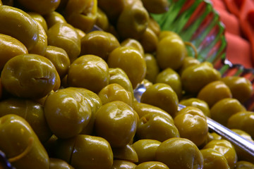 Green olives on a plate