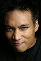 Obraz premium Cocky asian man portrait