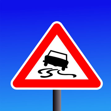 slippery road sign