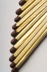 Wooden matches against the white background
