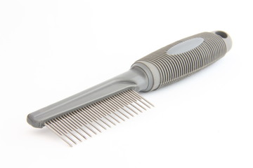 Pets comb with two rows of prongs on white background