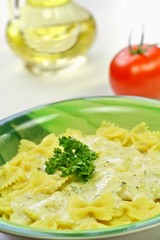 Pasta and sauce with herbs