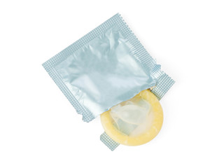 Unwrapped condom isolated on a white background.