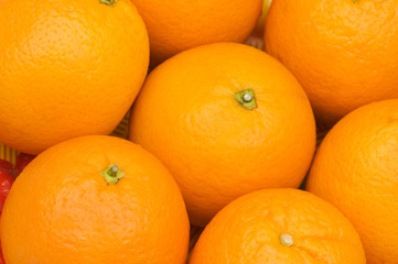 Close up of many oranges on the market