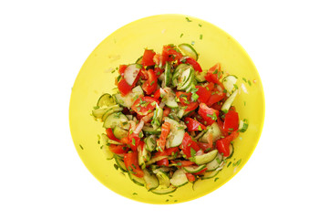 simple light vegetable salad over white background