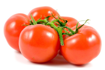 Fresh tomatoes  isolated on a white background.