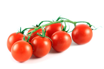 Fresh tomatoes  isolated on a white background.