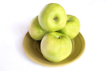 Granny smith green apples arranged in a pile